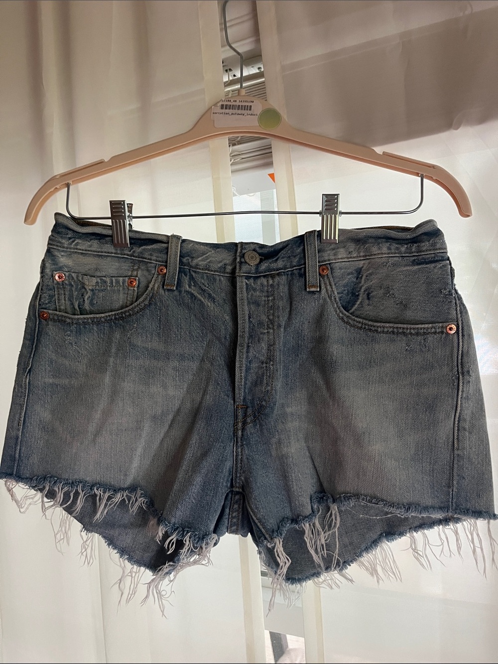 Levi's Distressed Light Blue Cutoff Jean Shorts